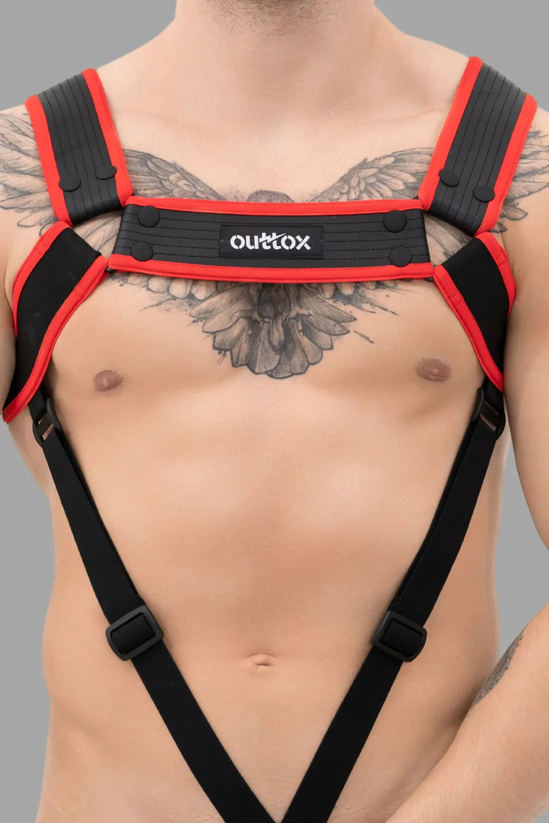 Outtox. Harnais de corps avec boutons-pression. Noir et rouge