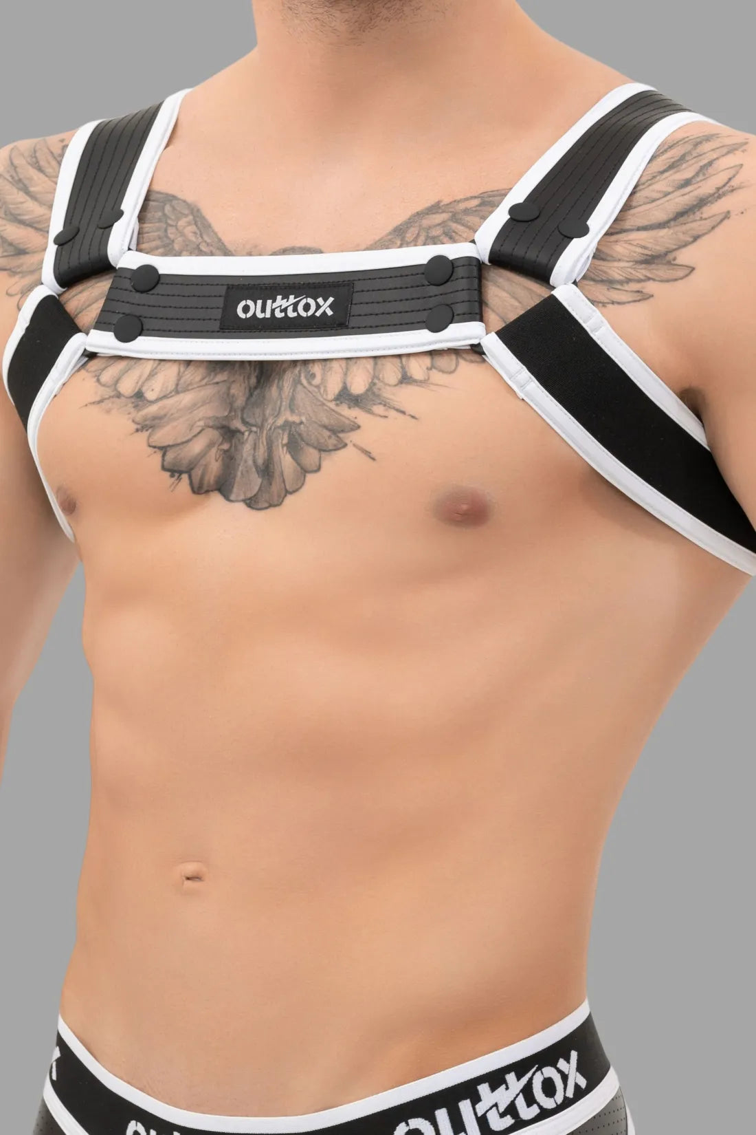 Outtox. Harnais Bulldog avec boutons-pression. Noir et blanc