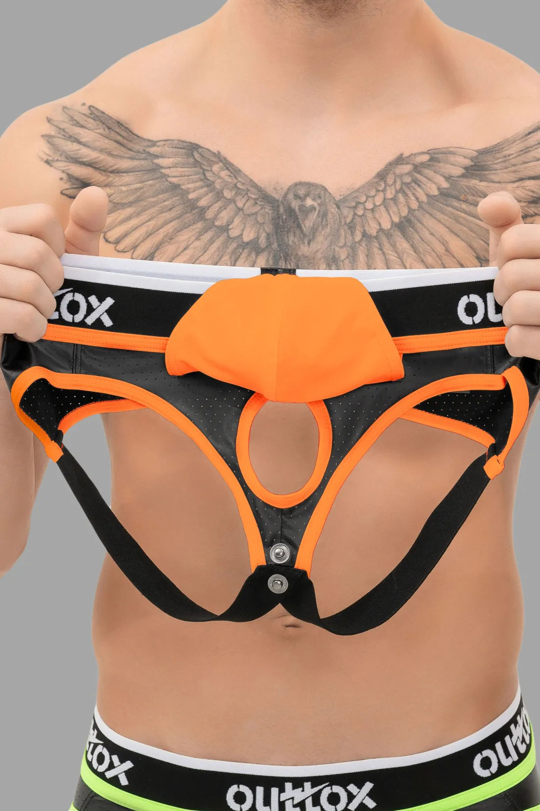 Outtox. Jock mit Druckknopf-Codpiece. Schwarz und Orange